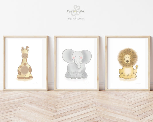 set of 3 jungle safari nursery prints with a giraffe, lion and elephant