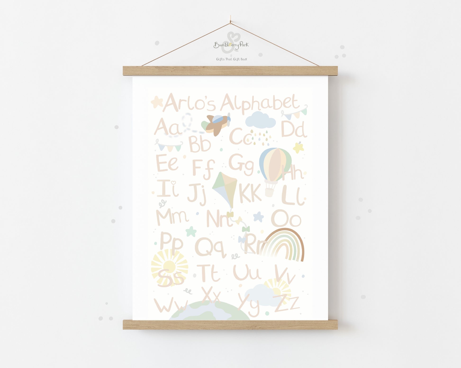 alphabet nursery print in neutral colours with little explorer theme with aeroplanes, clouds, hot air balloons kits and rainbows