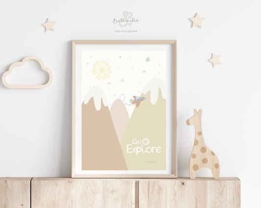 go explore adventure art print in neutral tones in a light wood frame in a baby's nursery