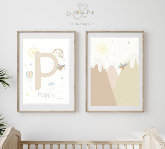 Travel and transport theme nursery bedroom wall print in neutral colours for a baby girl and boy with hot air balloons, rainbows, sunshine and aeroplanes and mountains