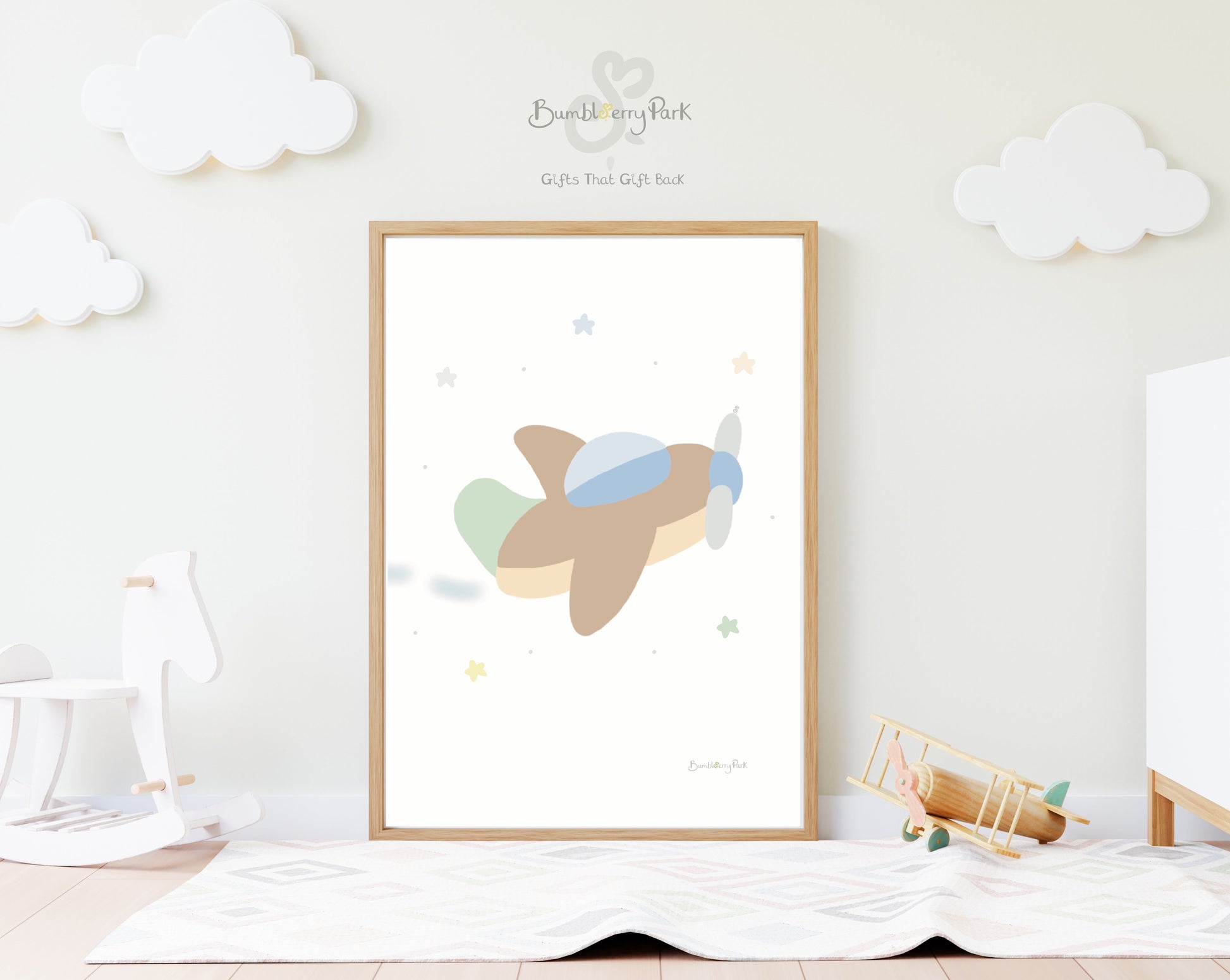 personalised children's name wall print of an aeroplane flying through the stars in neutral colours in a nursery