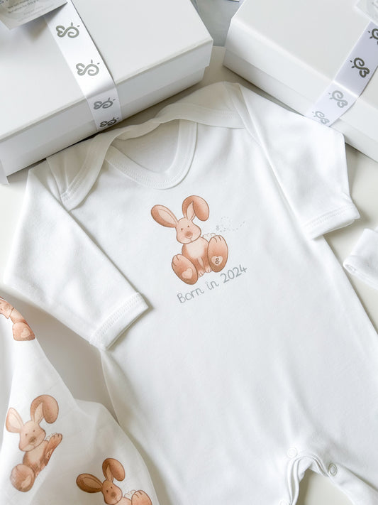 woodland bunny rabbit baby sleepsuit with white background