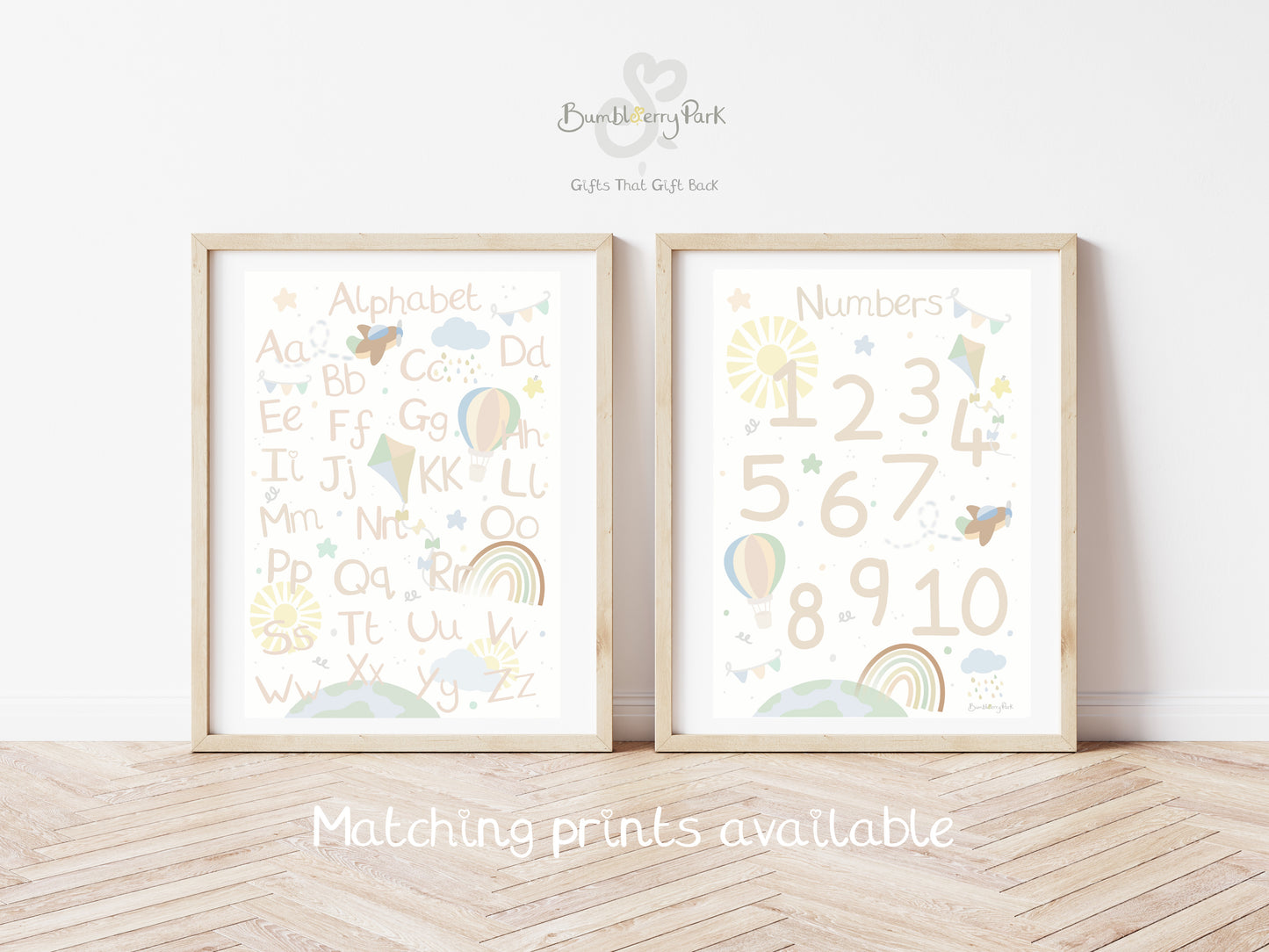 set of two matching little explorer nursery posters for children's bedroom. Neutral nursery decor prints with travel and transport theme decor with mountains, sunshine, hot air balloon and aeroplane features