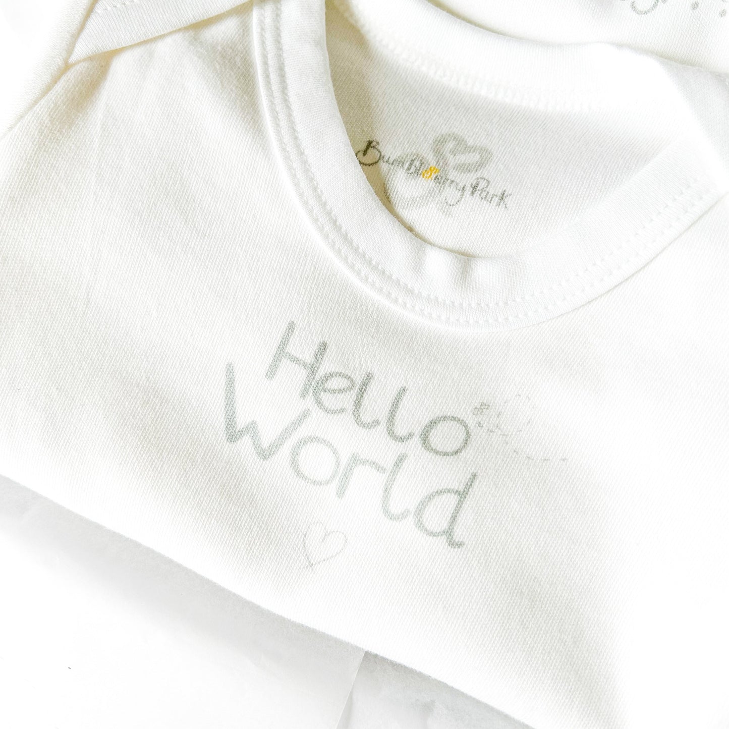 hello world white baby bodysuit with silver love heart print