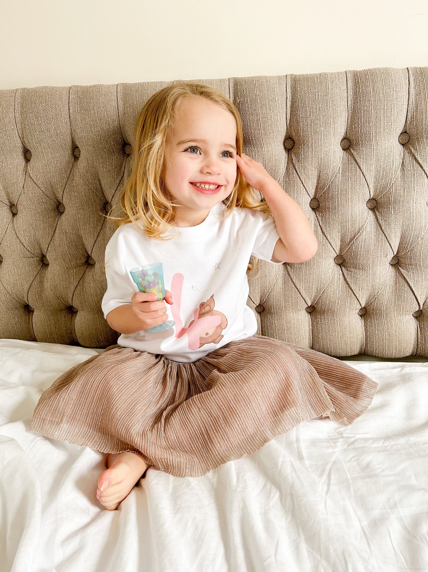 toddler girl wearing pink tutu and personalised 4th birthday t-shirt