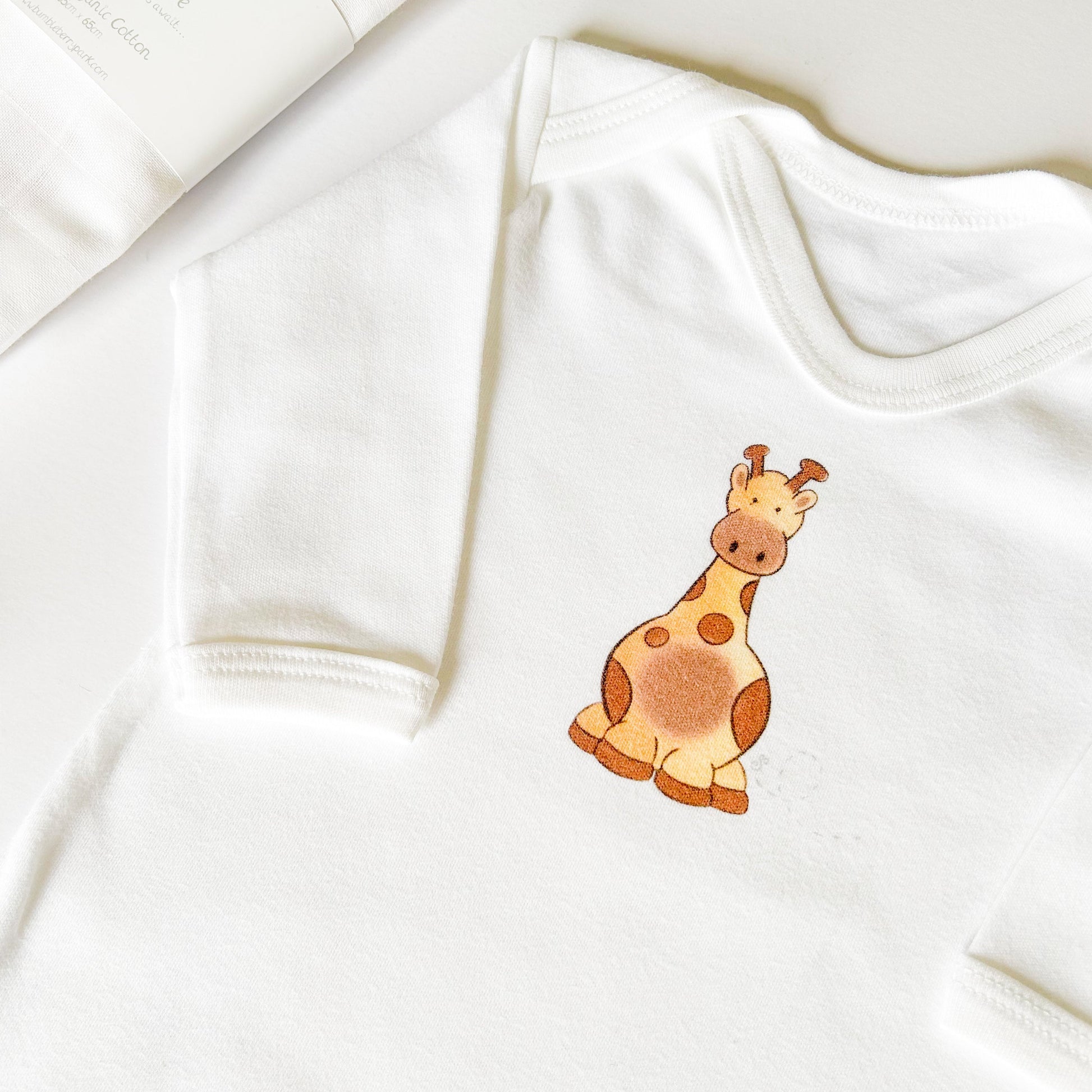 new baby boy sleepsuit with safari giraffe print