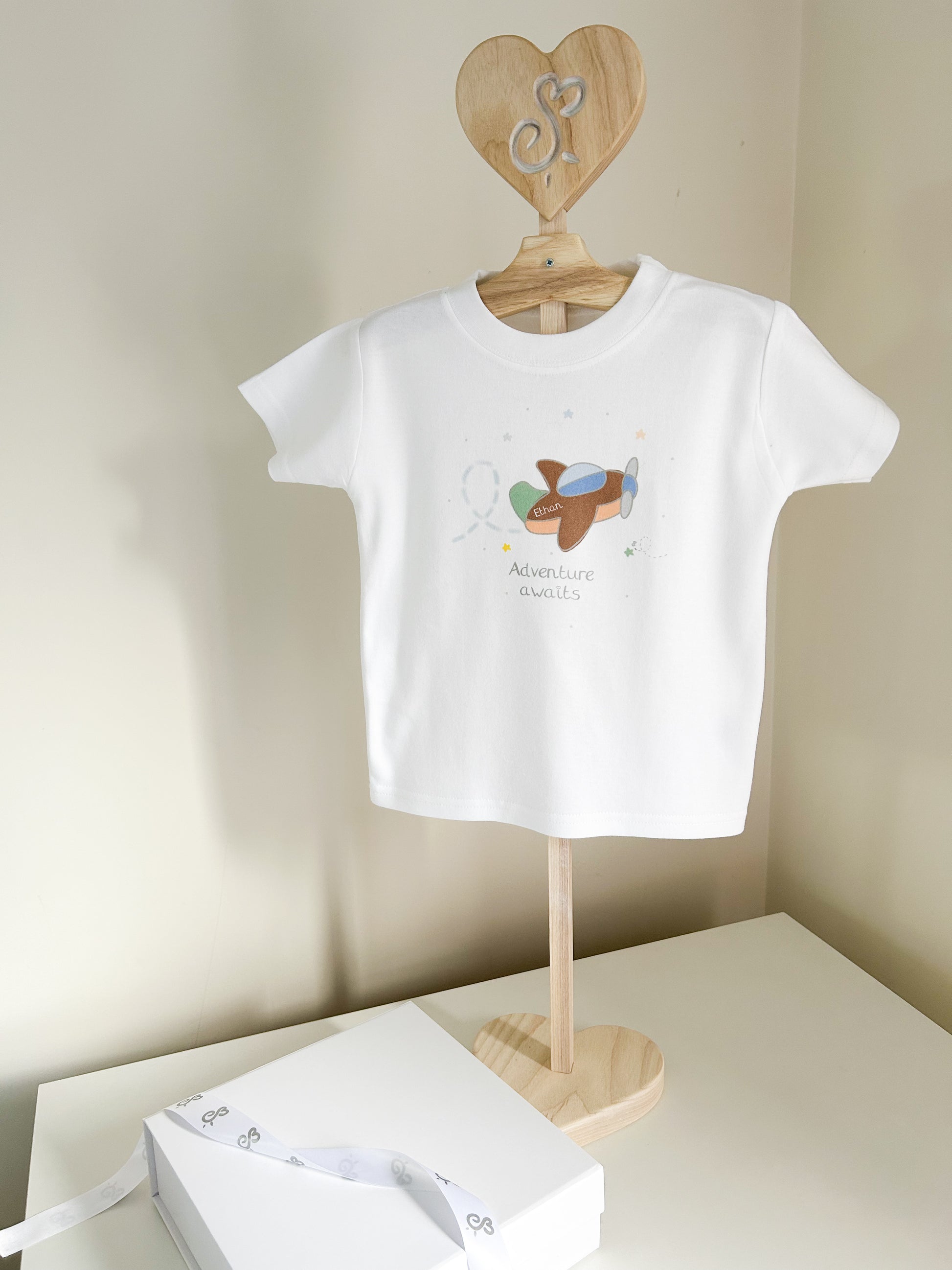 100% cotton first holiday t-shirt and sweatshirt for children with aeroplane design and personalised name tag
