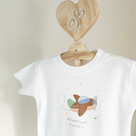 baby and children's white t-shirt with adventure awaits aeroplane design in neutral colours