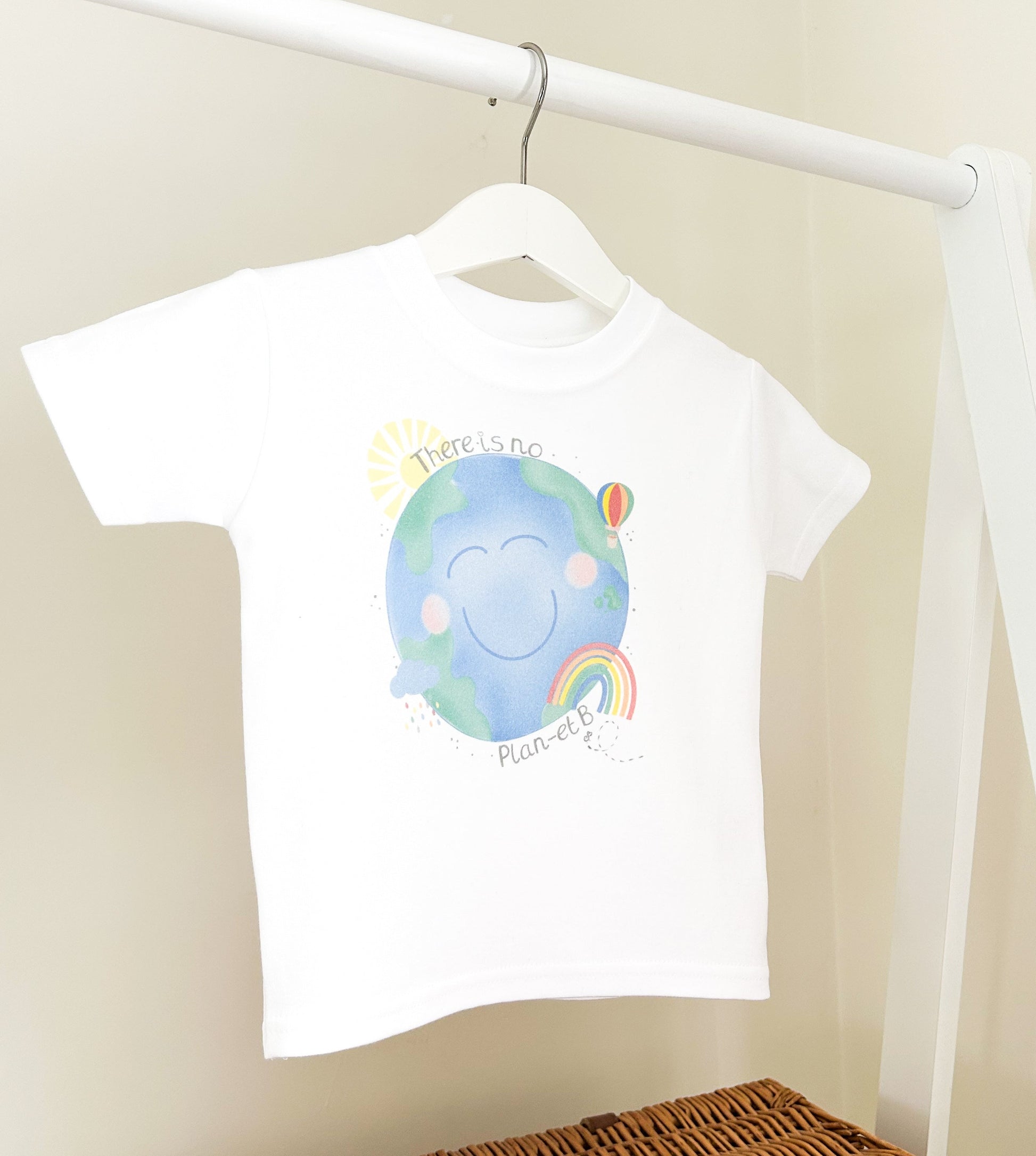 children's clothes rail with a planet earth design t-shirt