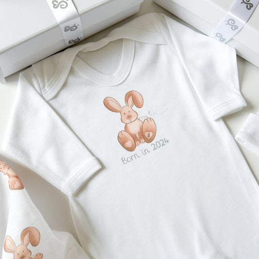 woodland bunny rabbit baby sleepsuit with white background