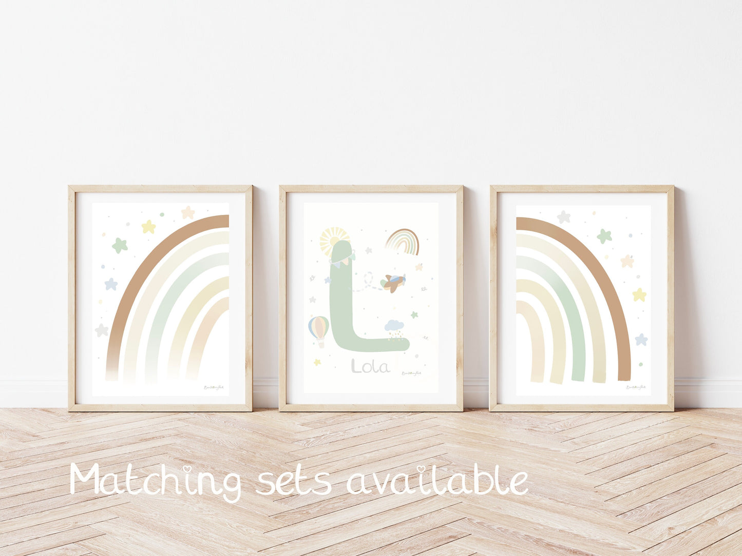set of three children's bedroom wall prints with scandi rainbows and baby name print
